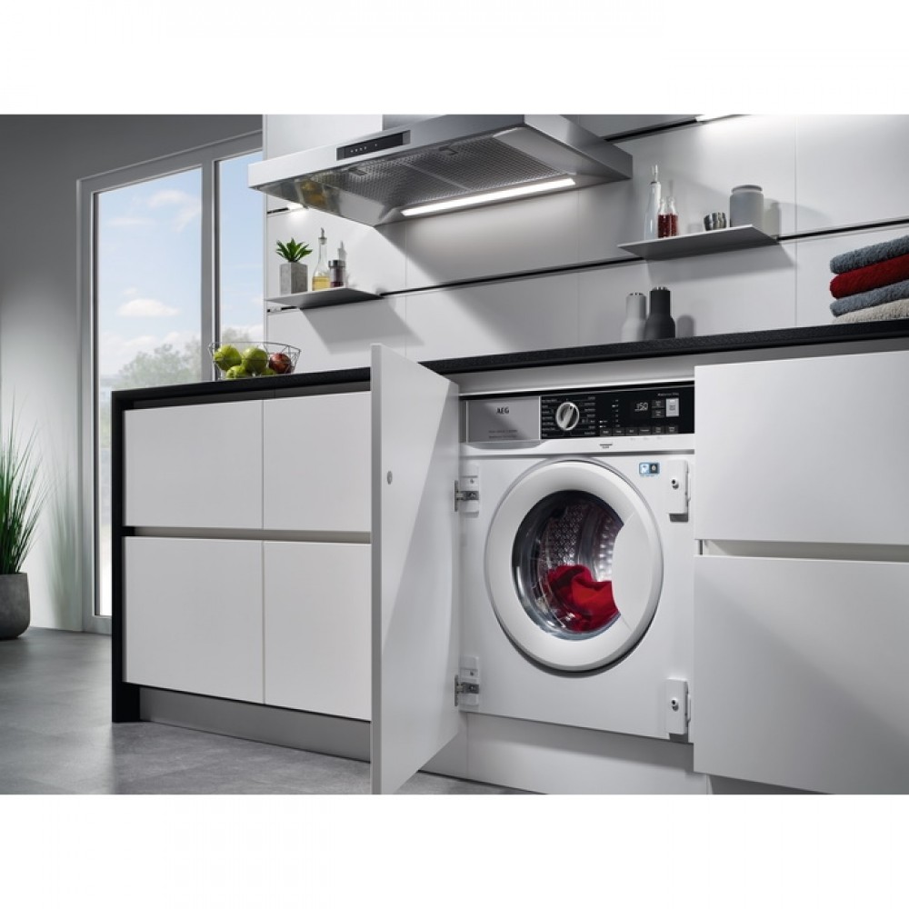 Bosch 8 series стиральная машина. AEG 7000 Series PROSTEAM. Стиральная машина. Стиральная машина на кухне. Стиральная машина на кухне под столешницей.